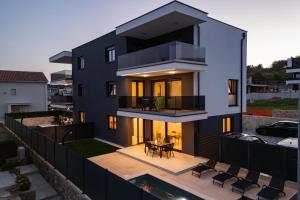 an aerial view of a house with a balcony at Apartment Island Krk Queen 1 in Krk