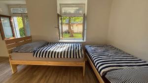Postel nebo postele na pokoji v ubytování Domek v Třeboni