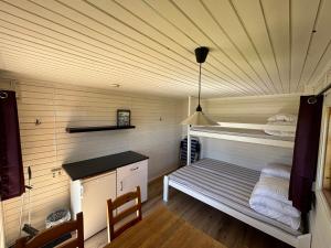 Postel nebo postele na pokoji v ubytování Steiner's Camping & Lodge