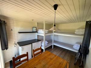 Postel nebo postele na pokoji v ubytování Steiner's Camping & Lodge
