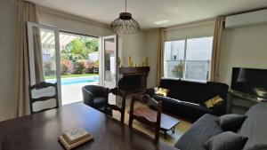 Et opholdsområde på La Maison de la plage piscine chauffée et plage à 200 m