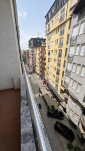 a view of a city street with buildings and cars at Pristina City Apartment in Pristina