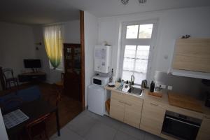 Kuchyň nebo kuchyňský kout v ubytování Le gîte clos Monade