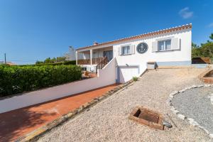 a house with a large yard in front of it at AnchorHouse Portugal in Aljezur