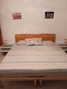 Postel nebo postele na pokoji v ubytování Al Porto low cost