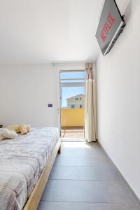 Letto o letti in una camera di MaBi