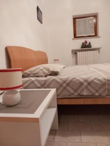 Postel nebo postele na pokoji v ubytování Al Porto low cost