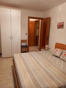 Postel nebo postele na pokoji v ubytování Al Porto low cost