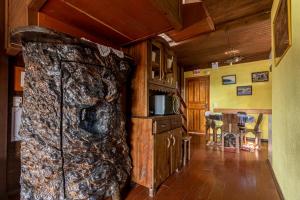 TV a/nebo společenská místnost v ubytování CHALÉ DO CAPITÃO com Hidro - URUBICI