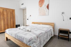 Letto o letti in una camera di MaBi