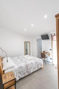 Letto o letti in una camera di MaBi
