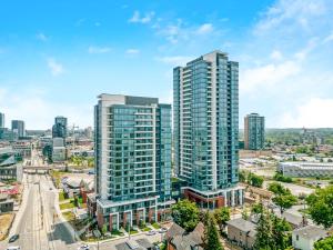 an aerial view of a city with tall buildings at Modern 1BR Condo - King bed - Cityscape Views in Kitchener