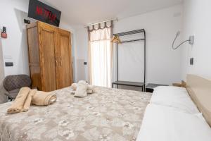 Letto o letti in una camera di MaBi