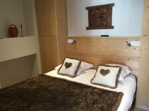Säng eller sängar i ett rum på Appartement Valloire, 4 pièces, 6 personnes - FR-1-263-362