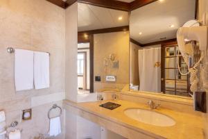 Um banheiro em Hotel Inglaterra - Charme & Boutique