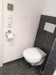 Koupelna v ubytování Apartment in Lindenberg, Goßholz