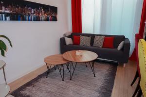 Χώρος καθιστικού στο Appartement chaleureux à 10 minutes de la Défense