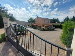 a view from a balcony of a house at Villa CALLY, chez MARIUS in Vidauban