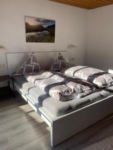 Postel nebo postele na pokoji v ubytování Bergnest