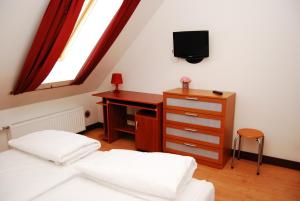 Postel nebo postele na pokoji v ubytování A1 Hotel Riga City Center