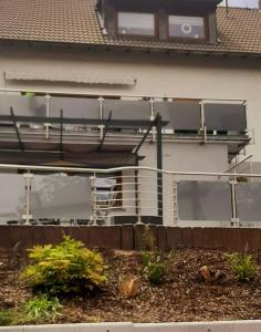 a building with scaffolding on the side of it at Kleines Glück in Burgbrohl