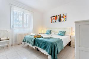 Postel nebo postele na pokoji v ubytování Chalet Irene by dracmallorca + 25 fotografií