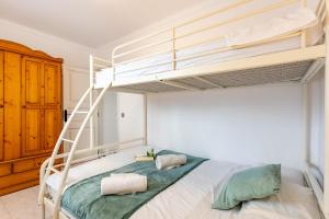 Postel nebo postele na pokoji v ubytování Chalet Irene by dracmallorca