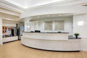 a large lobby with a counter in a pharmacy at Residence Inn Sandestin at Grand Boulevard in Destin