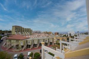 a view of a city from a balcony at Orlando 85 Complex - Costa Adeje in Adeje