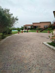 Vonkajšia záhrada v ubytovaní Luxury Villa Spaccasole su Cortona - Sauna & Infinity Pool