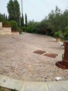 Vonkajšia záhrada v ubytovaní Luxury Villa Spaccasole su Cortona - Sauna & Infinity Pool