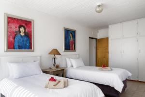 En eller flere senge i et værelse på Estuary Breeze