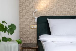 Voodi või voodid majutusasutuse PAPPAS hotel&studio toas