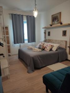 Posteľ alebo postele v izbe v ubytovaní Appartamento relax Svitlana