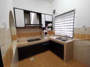 Kuchyň nebo kuchyňský kout v ubytování Kejora Guest House + 14 fotografií