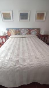 Postel nebo postele na pokoji v ubytování Chalet Matalascañas