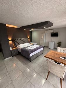 Кровать или кровати в номере İdeal Butik Otel