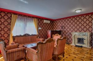 Posezení v ubytování Fried Kastély Hotel Simontornya