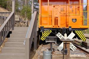 Gallery image of Seaboard Coast Line 0843 sleep in a caboose on a bison ranch in Clyde