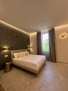 Postel nebo postele na pokoji v ubytování Elegant Rooms