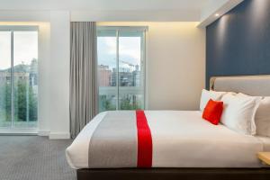 Voodi või voodid majutusasutuse Holiday Inn Express Dublin City Centre, an IHG Hotel toas