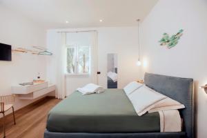 Postel nebo postele na pokoji v ubytování 0.8 Guest House