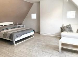En eller flere senger på et rom på Maison de 3 chambres avec jardin amenage et wifi a Bagnols