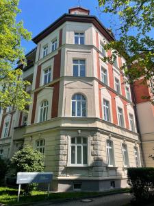 a large building with a tower on top of it at ElisaBett Erfurt - Apartment Elisa - 4 Schlafzimmer und 2 Bäder, bis 6 Personen in Erfurt