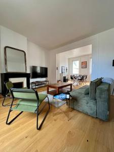 Et opholdsområde på Grand appartement vue théâtre Hyper Centre