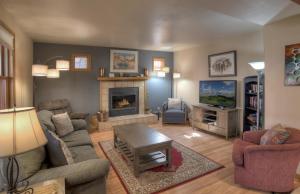 a living room filled with furniture and a fireplace at 2 2 Ferringway 13 in Durango