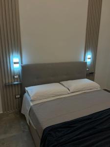 Postel nebo postele na pokoji v ubytování Rosina Apartament il corso + 18 fotografií