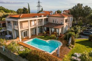 an aerial view of a house with a swimming pool at la belavista in Izola