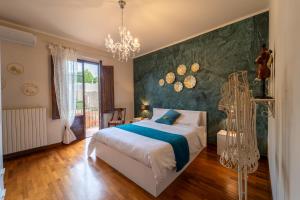 Posteľ alebo postele v izbe v ubytovaní Villa Desideria