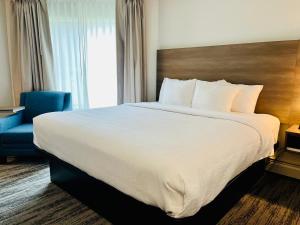 Postel nebo postele na pokoji v ubytování Quality Inn Kodiak